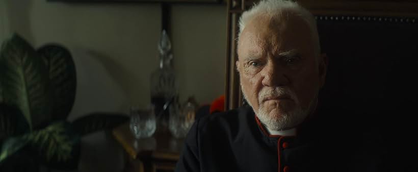 Malcolm McDowell in Father Stu (2022)