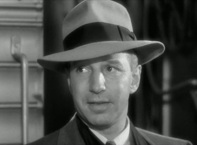 Lloyd Nolan in Two Smart People (1946)