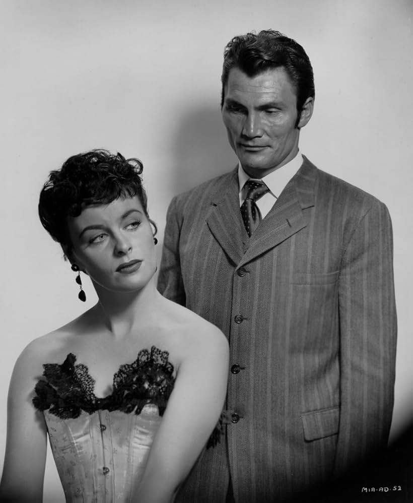 Jack Palance and Constance Smith in Man in the Attic (1953)