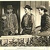 Tim Holt, Lee 'Lasses' White, and Ray Whitley in Thundering Hoofs (1942)