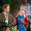 Emily Tennant and Niall Matter in Holiday Hotline (2023)