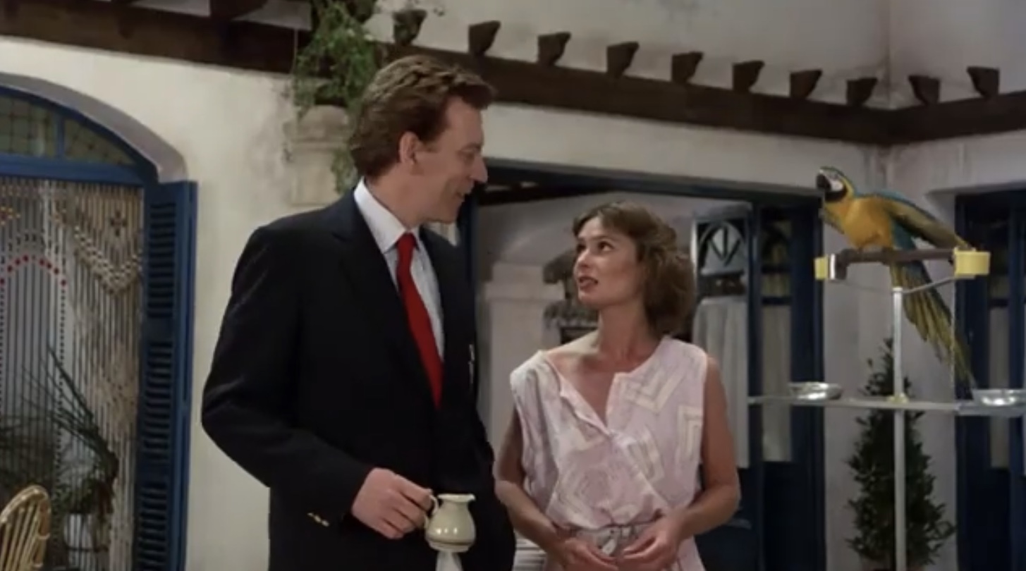 Donald Sutherland and Lucy Gutteridge in The Trouble with Spies (1987)