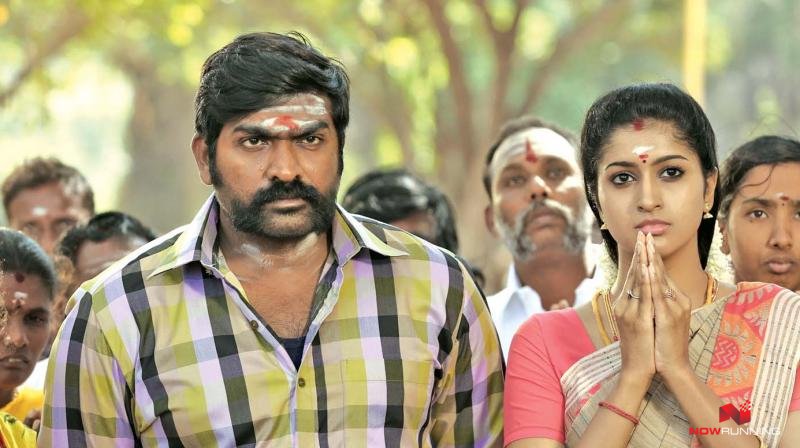 Vijay Sethupathi and Tanya S Ravichandran in Karuppan (2017)