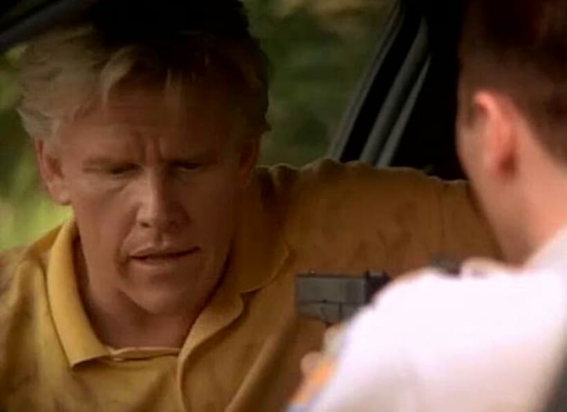 Gary Busey in Plato's Run (1997)