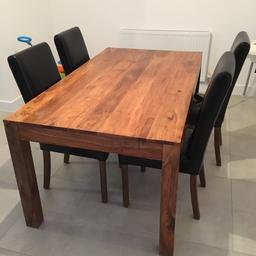 Much loved table and four leather chairs. Chairs need a recover but structurally sound and table is very sturdy. Size 160 x 90. One small mark on table that can be seen in pic. Collection only. SFS. 