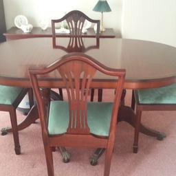 mahogany oval table and four chairs, with separate extendable centre section. In very good condition. Collection only