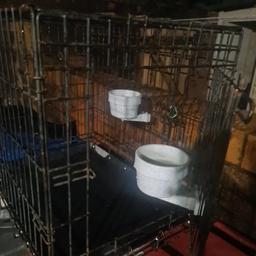 Bird/parrot Travel Cage.
 some rust but is still perfectly useable

Two feeding bowls