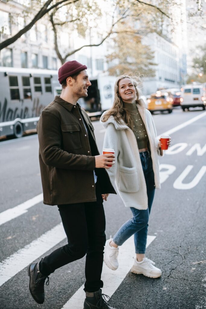 a couple walking down the street