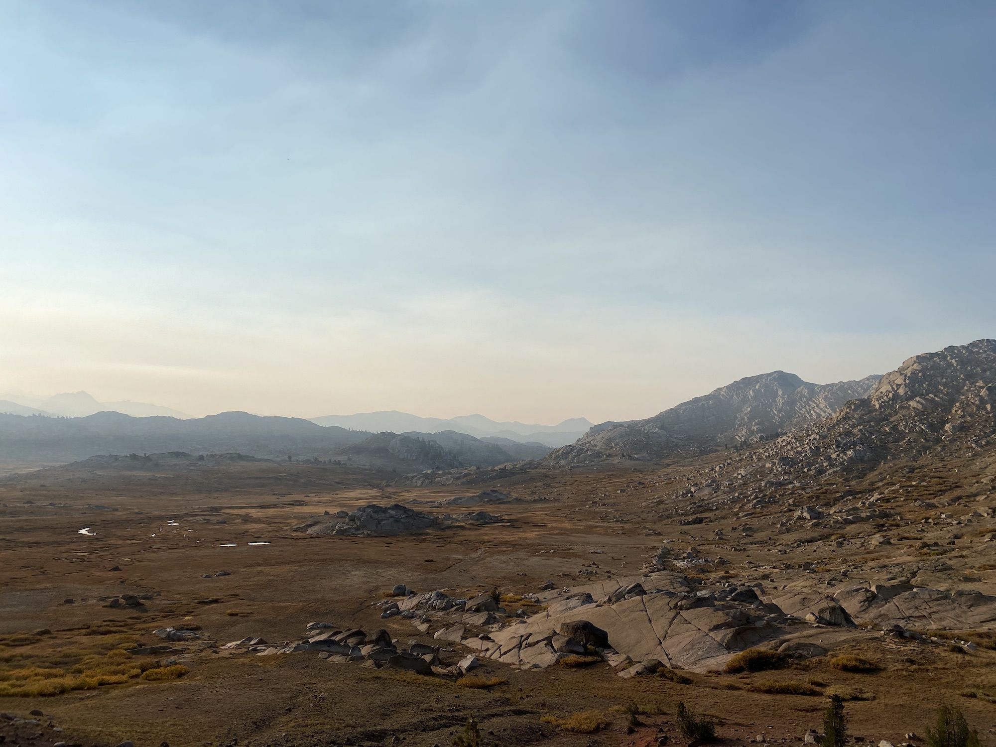 Heavy smoke over mountains.