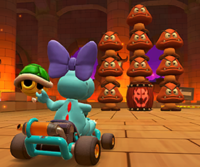 Thumbnail of the Monty Mole Cup challenge from the Animal Tour; a Goomba Takedown challenge set on RMX Bowser's Castle 1