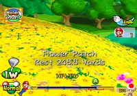 The ball lands in a flower patch.