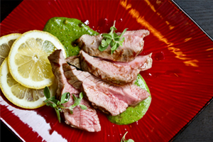 ROASTED LEG OF LAMB W/ HERB & ALMOND PESTO
