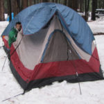 tent with end of poles sticking into snow instead of set in tent