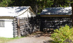 two tent cabins next to each other