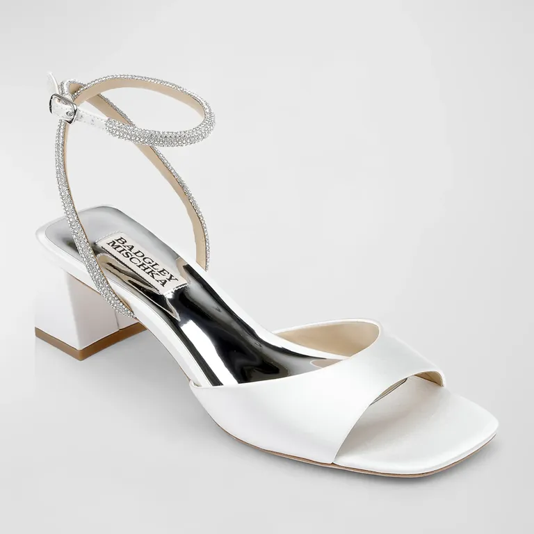 White wedding shoes with chunky heel and embellished strap