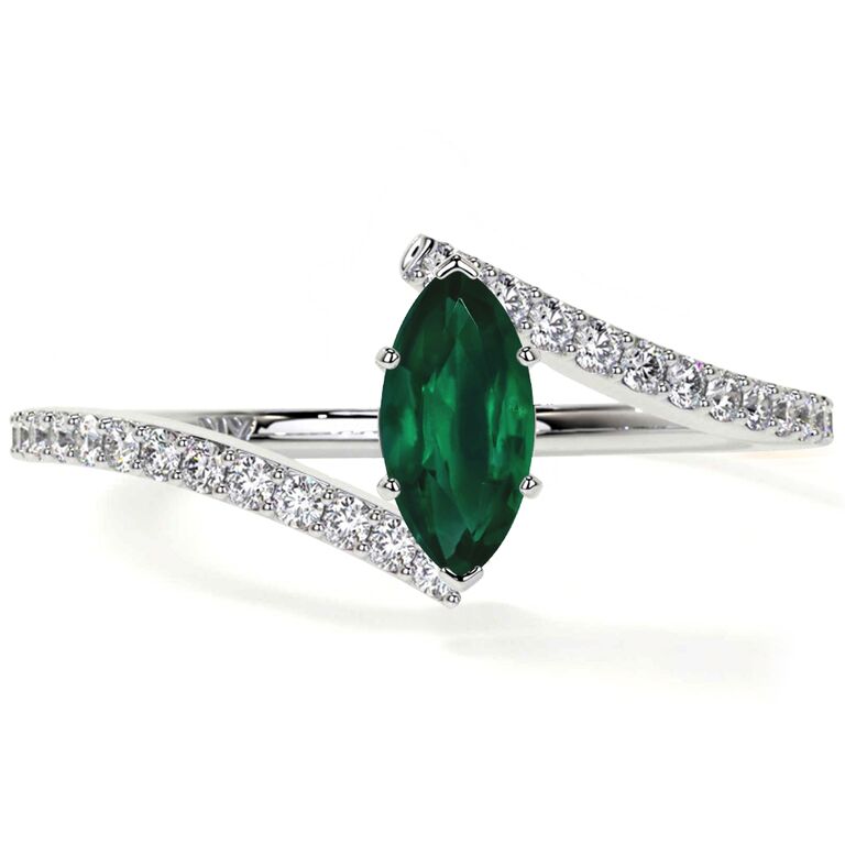 Marquise emerald bypass Taylor Swift inspired engagement ring