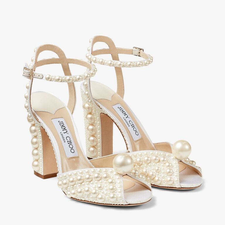 Pearl embellished block heel shoes by Jimmy Choo. 