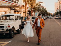 Bride and groom walking down street in Charleston, South Carolina, how to get married in South Carolina