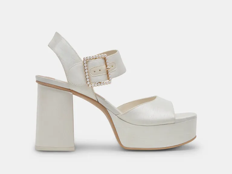 White open-toe block heels with pearl embellishment