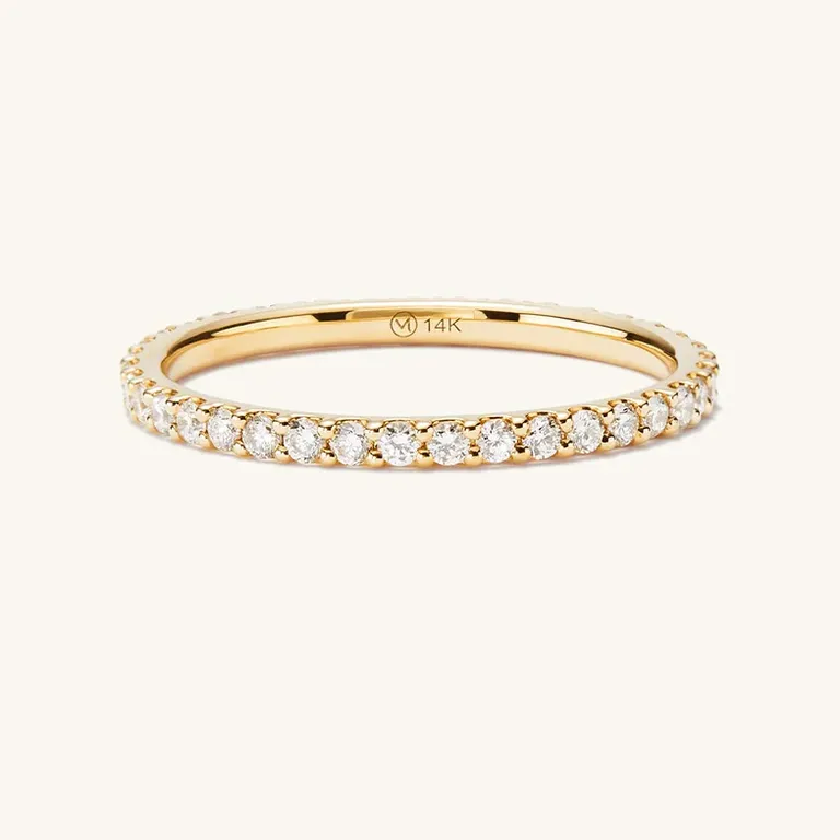 Yellow gold diamond eternity band inspired by Taylor Swift from Mejuri