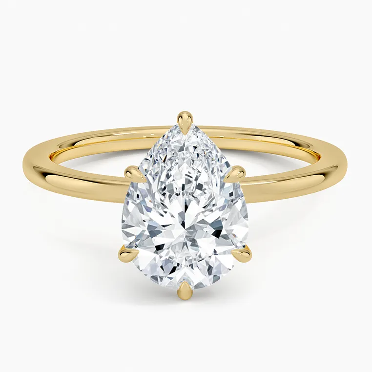 Brilliant Earth secret halo pear shaped diamond engagement ring inspired by Taylor Swift