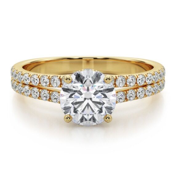 Double gold band with studded diamonds engagement ring