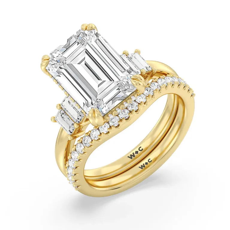 Emerald cut diamond engagement ring with yellow gold band inspired by Taylor Swift from With Clarity