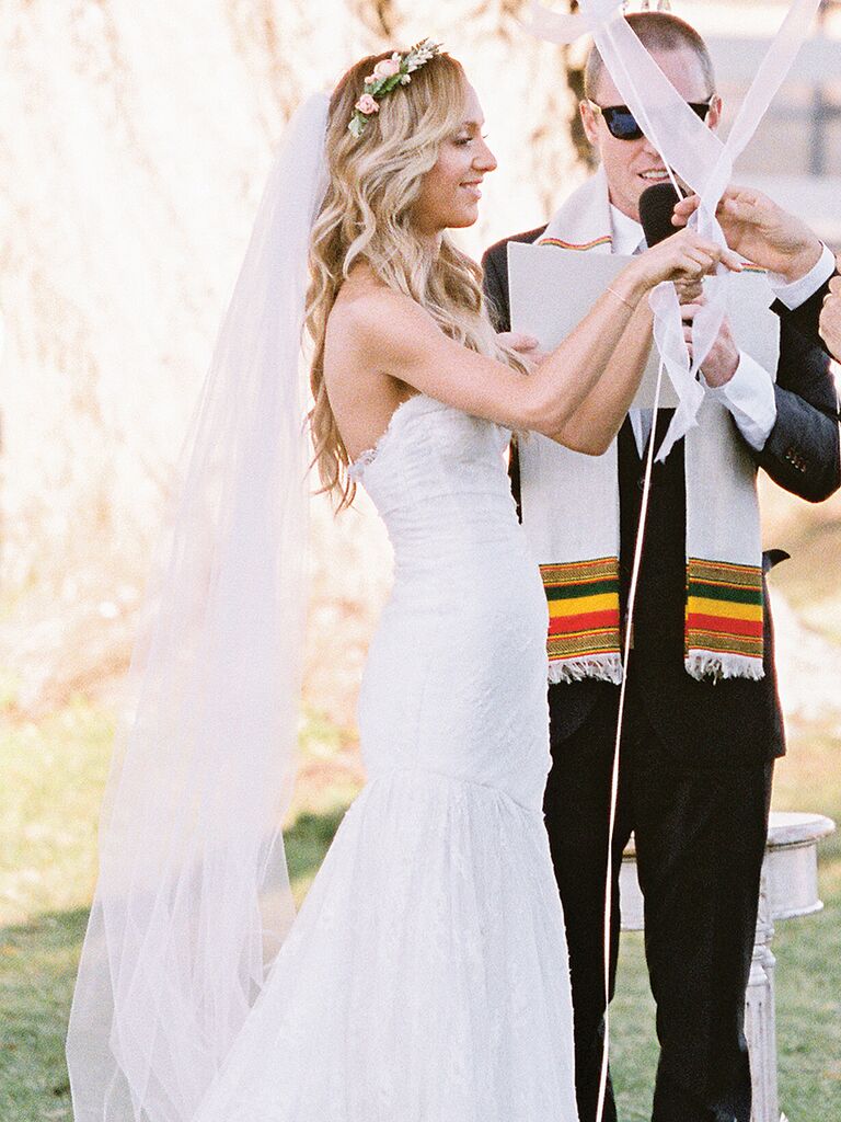 Pink flower crown with a long floor-length veil