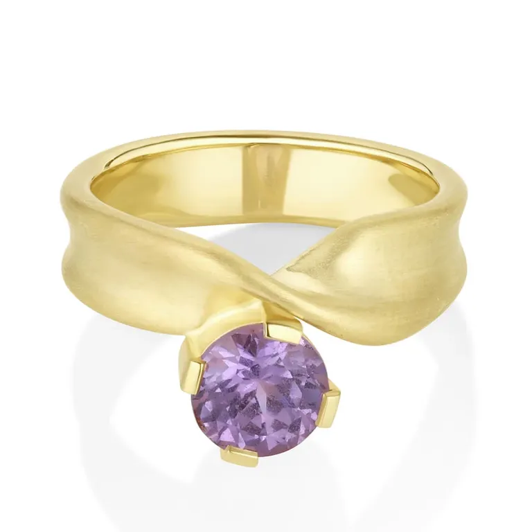 Purple sapphire twist Taylor Swift inspired engagement ring from Marrow