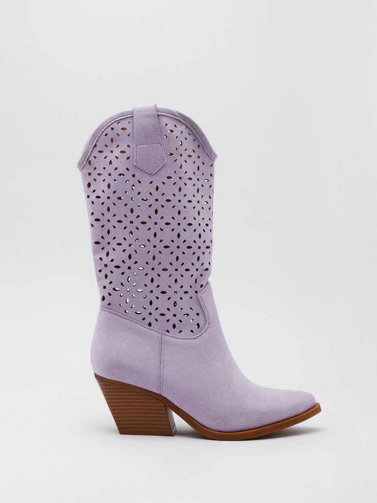 Purple suede cowboy boots. 