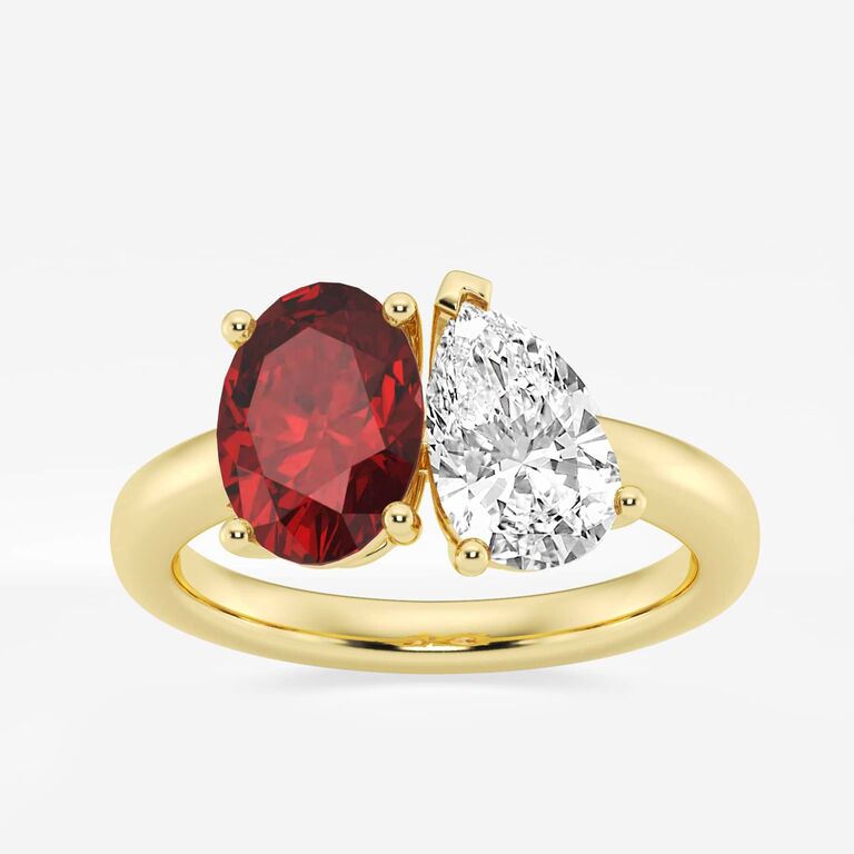 Oval cut ruby and pear cut diamond Taylor Swift inspired engagement ring from Grown Brilliance