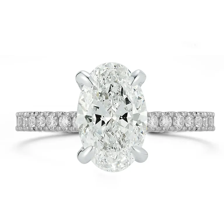 Oval pavé solitaire diamond engagement ring inspired by Taylor Swift from Dana Rebecca Designs