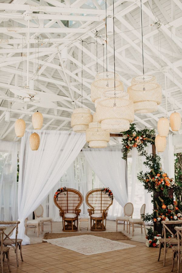 Boho mandap with woven chandeliers and peacock chairs