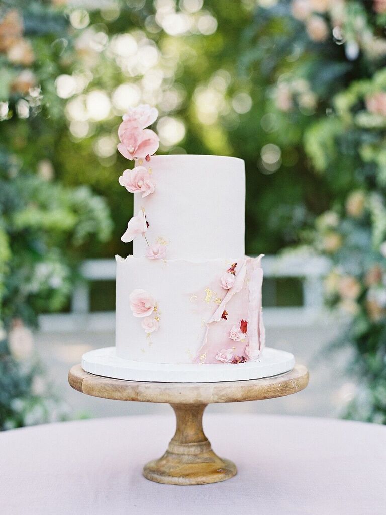 Two-tier spring floral wedding cake with pink flowers