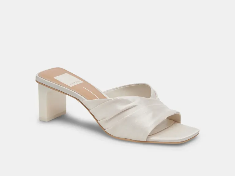 Off white low block heel slides from Dolce Vita