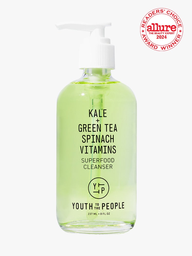 Youth to the People Superfood Antioxidant Cleanser bottle of green facial cleanser with white pump on light gray...