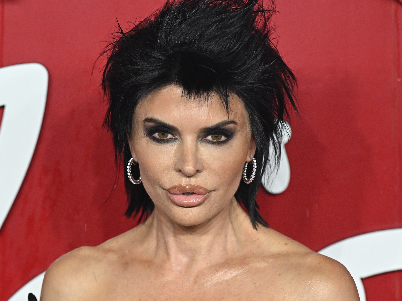 Lisa Rinna's Wigs Were the Real Star of Paris Couture Week