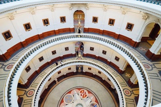 Image may contain Banister Handrail Human Person Clock Tower Architecture Tower and Building