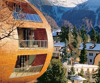 Image may contain Tree Plant Housing Condo Building and Outdoors