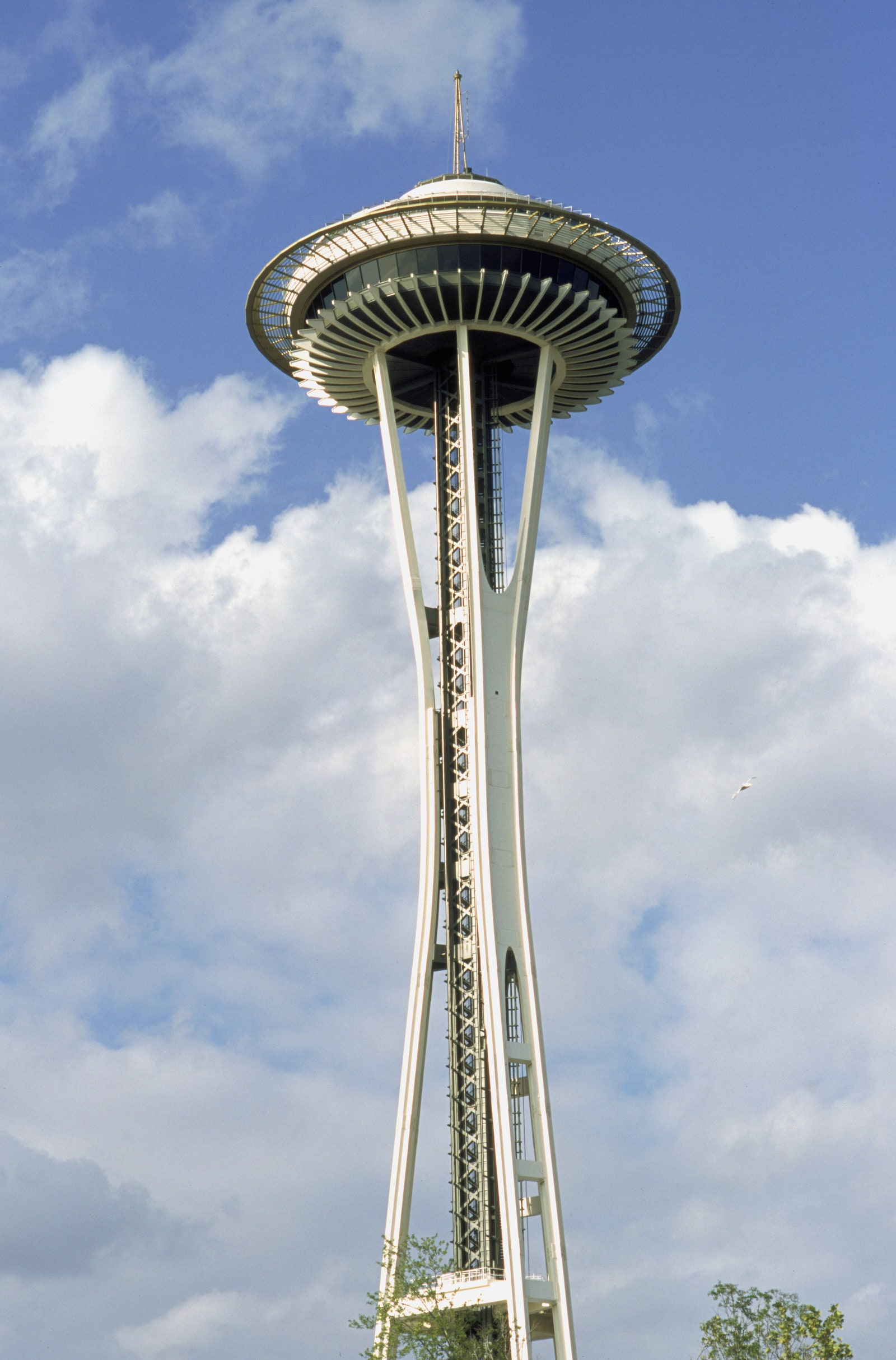 a tall thin tower with a circular observation deck up top