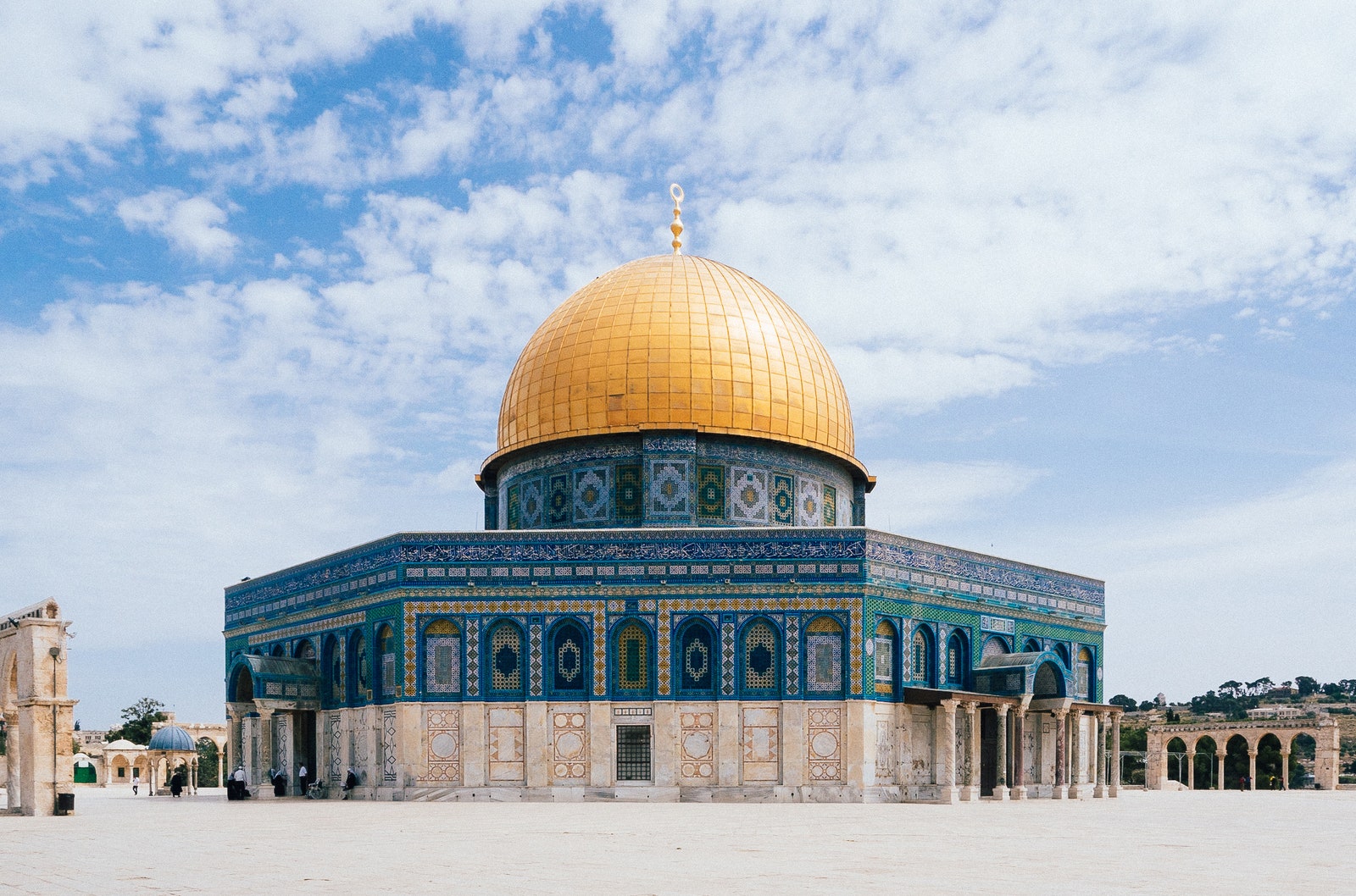 gold dome top with blue tiles surrounding