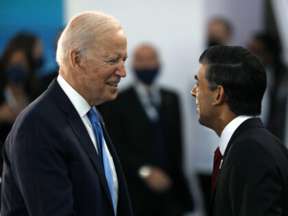 U.S. President Joe Biden, left, speaks with Rishi Sunak, U.K. Chancellor of the Exchequer,