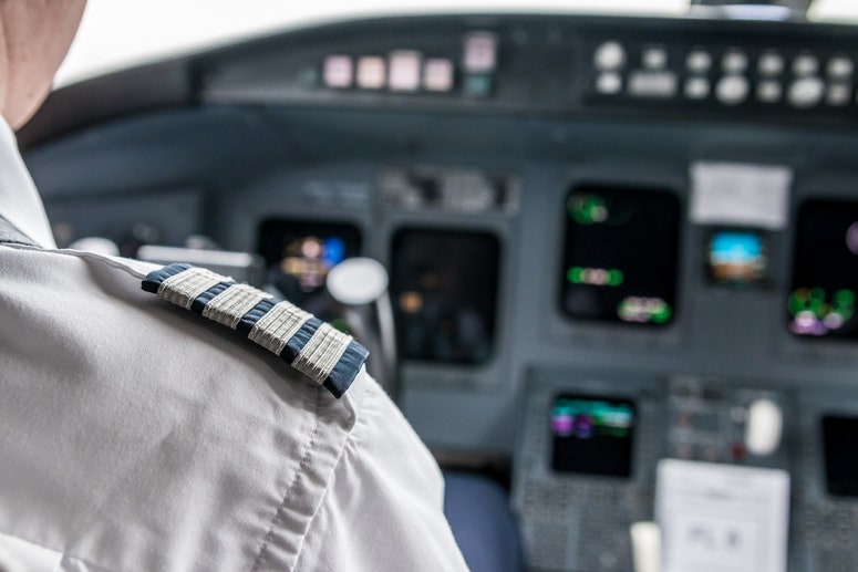 Pilot in cockpit.