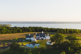 aerial of Inns of Aurora. house. lake.