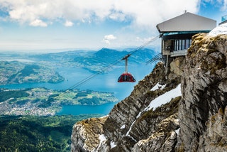 Image may contain Nature Outdoors Snow Transportation Vehicle and Ski Lift