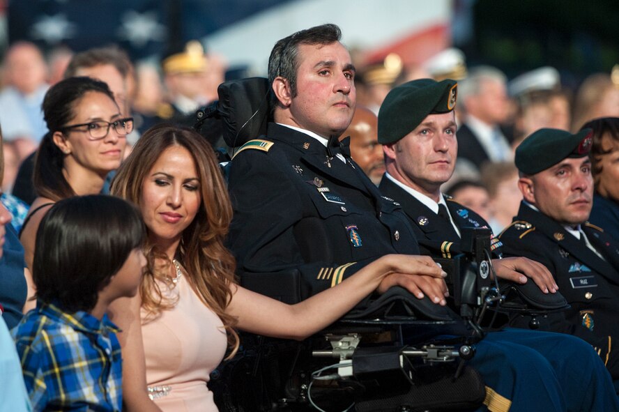 Wounded warrior Romulo Camargo, a retired Army chief warrant officer, and his family.