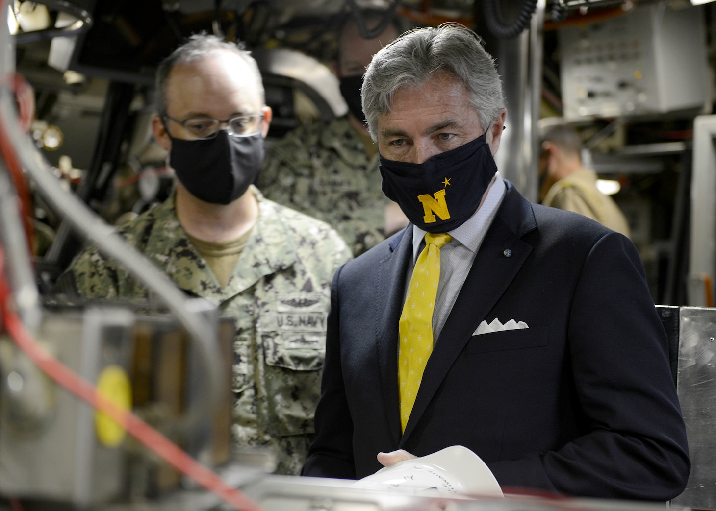 Secretary of the Navy Kenneth J. Braithwaite tours the control space aboard the Ohio-class ballistic-missile submarine USS Rhode Island (SSBN 740) (Blue) with commanding officer Cmdr. Jeremy Miller during his visit to Naval Submarine Base Kings Bay, Ga.