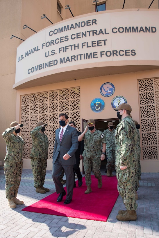 NAVAL SUPPORT ACTIVITY BAHRAIN (Oct. 28, 2020) Vice Adm. Samuel Paparo, commander of U.S. Naval Forces Central Command (NAVCENT), U.S. 5th Fleet and Combined Maritime Forces, walks with Secretary of Defense Dr. Mark T. Esper during a visit to the NAVCENT headquarters on board Naval Support Activity Bahrain, Oct. 28 . NAVCENT is the U.S. Navy element of U.S. Central Command in the U.S. 5th Fleet area of operations and encompasses about 2.5 million square miles of water area and includes the Arabian Gulf, Gulf of Oman, Red Sea and parts of the Indian Ocean. The expanse is comprised of 20 countries and includes three critical choke points at the Strait of Hormuz, the Suez Canal and the Strait of Bab al Mandeb at the southern tip of Yemen. (U.S. Navy photo by Mass Communication Specialist 2nd Class Jordan Crouch)