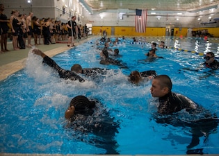 Recruits receive training at the USS Indianapolis Combat Pool at Recruit Training Command.