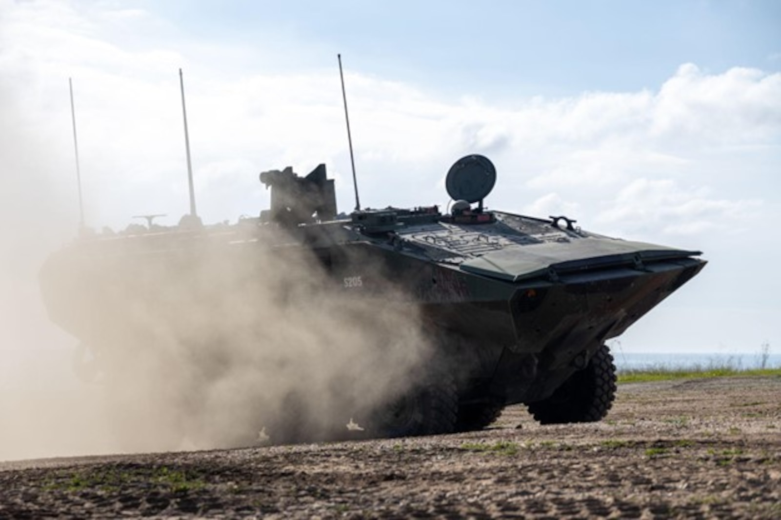 U.S. Marines with Assault Amphibian School ground guide an Amphibious Combat Vehicle during a Basic Land Driving course at Fire Base Gloria at Marine Corps Base Camp Pendleton, California, Feb. 29, 2024. ACV crewmember students must successfully complete this 80-day course as part of their required certifications to operate the ACV. The Marine Corps is taking a deliberate approach to fielding the ACV to the Fleet Marine Force to ensure our Marines understand the platform’s capabilities and can operate it safely and proficiently.